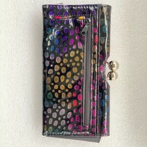 Black clutch 👛 with multi color spots; used